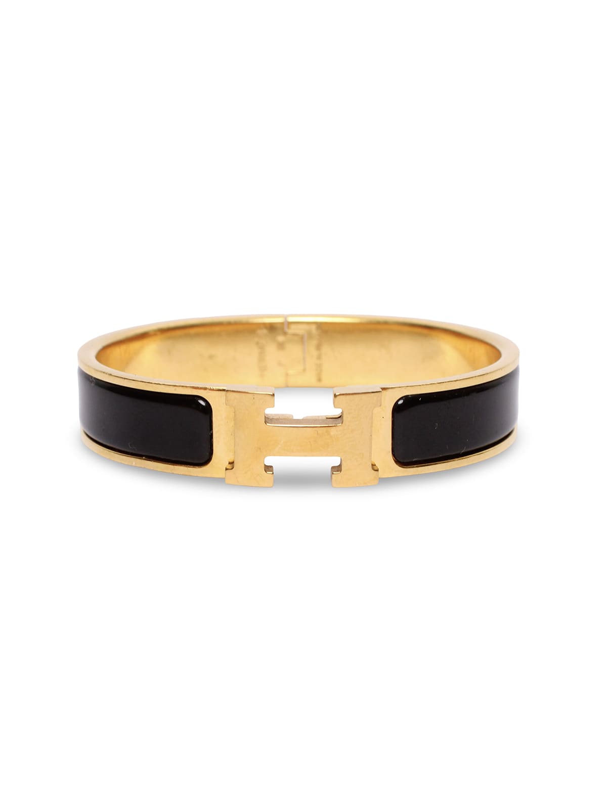 Brazalete Hermès con esmalte negro y herraje dorado