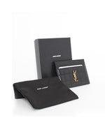 Tarjetero Yves Saint Laurent negro en piel matelassé