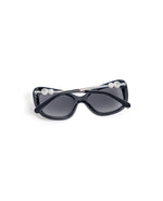 Lentes de sol Chanel diseño mariposa con perlas CC