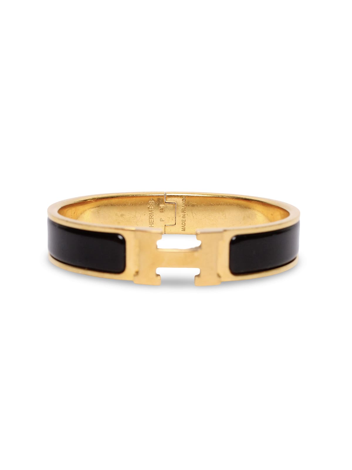 Brazalete Hermès con esmalte negro y herraje dorado