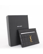 Tarjetero Yves Saint Laurent negro en piel matelassé